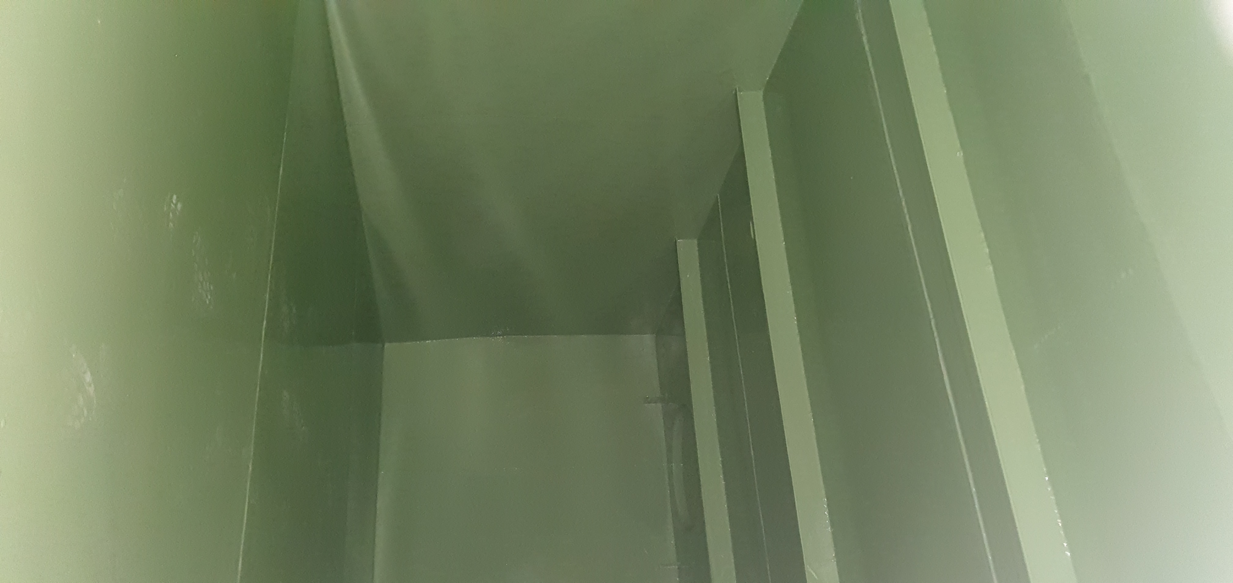 View of a basement-welded tank with internal coating for water storage 